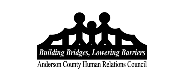 People holding hands creating a bridge.